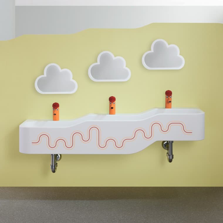 Espaço de diversão e para fazer a higiene Geberit Bambini em vermelho carmim e laranja Espaço de diversão e para fazer a higiene Geberit Bambini em vermelho carmim e laranja